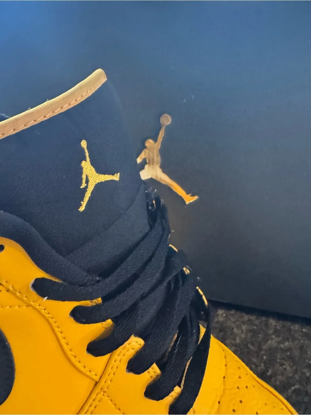 Jordan 1 Low University Gold